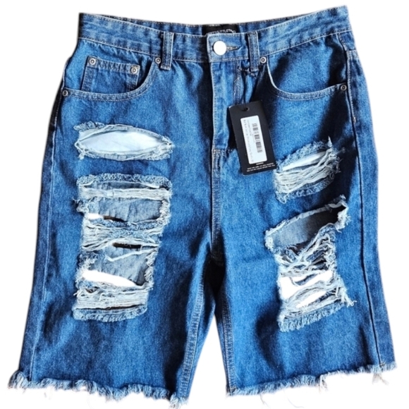 NWT PRETTY LITTLE THING MID WASH EXTREME DISTRESSED LONG SHORTS SIZE 10 - Picture 1 of 4